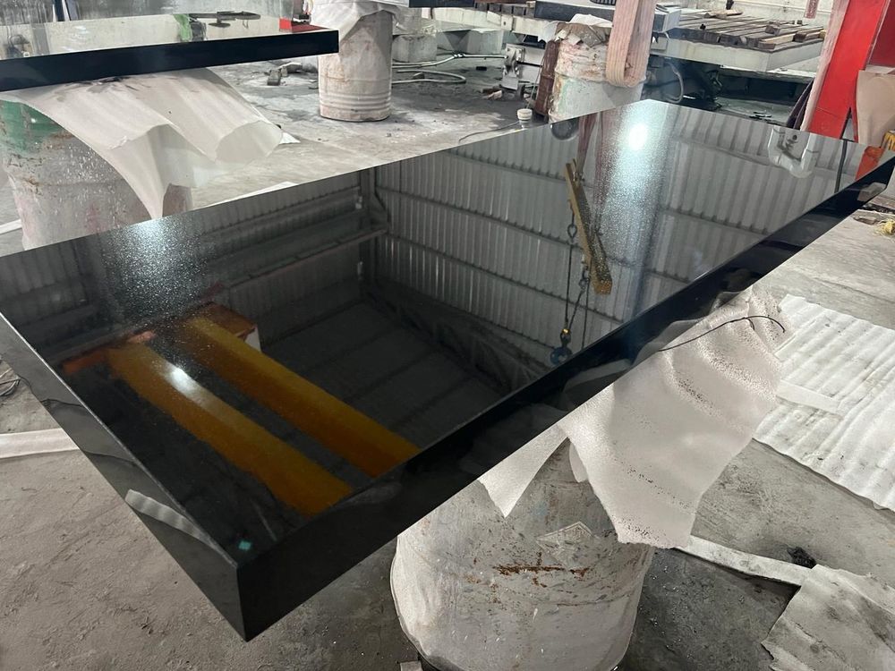 Freshly polished black granite slab in our factory
