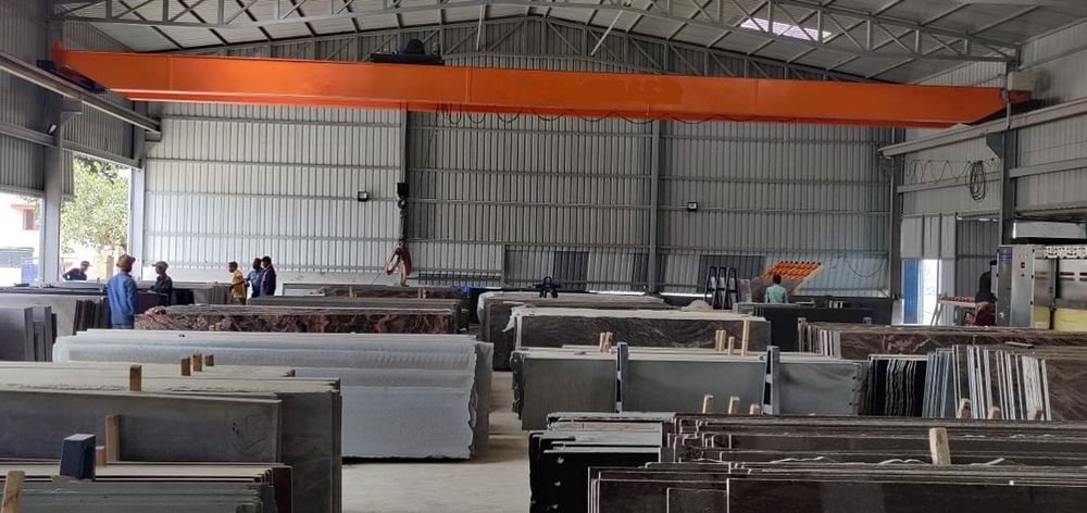 Factory hall with an overhead crane and slabs