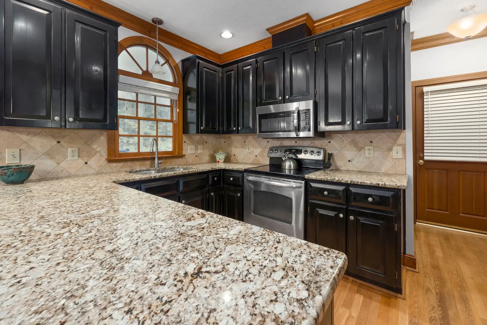 Kitchen with granite countertops