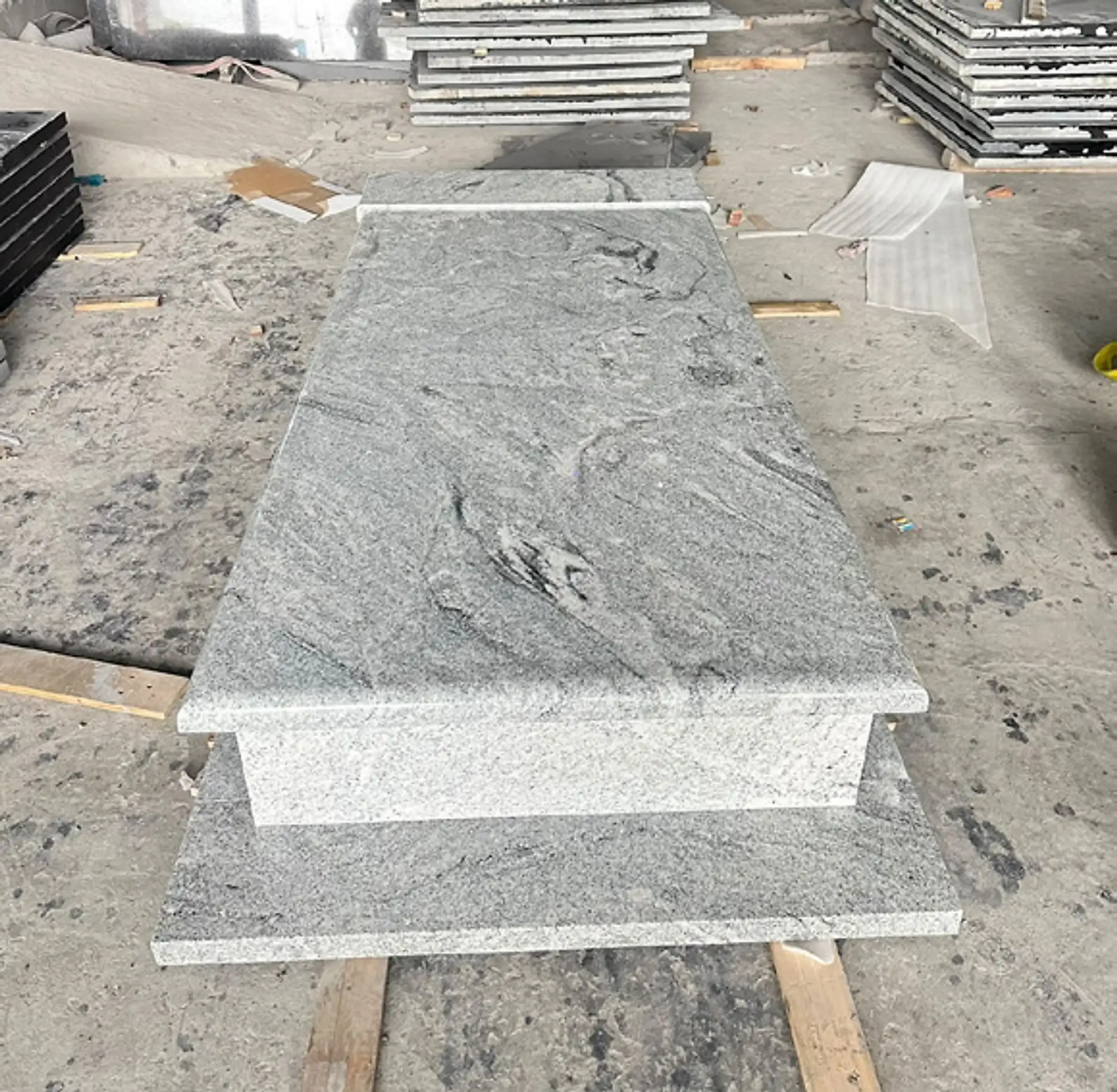 Grey granite ledger grave cover