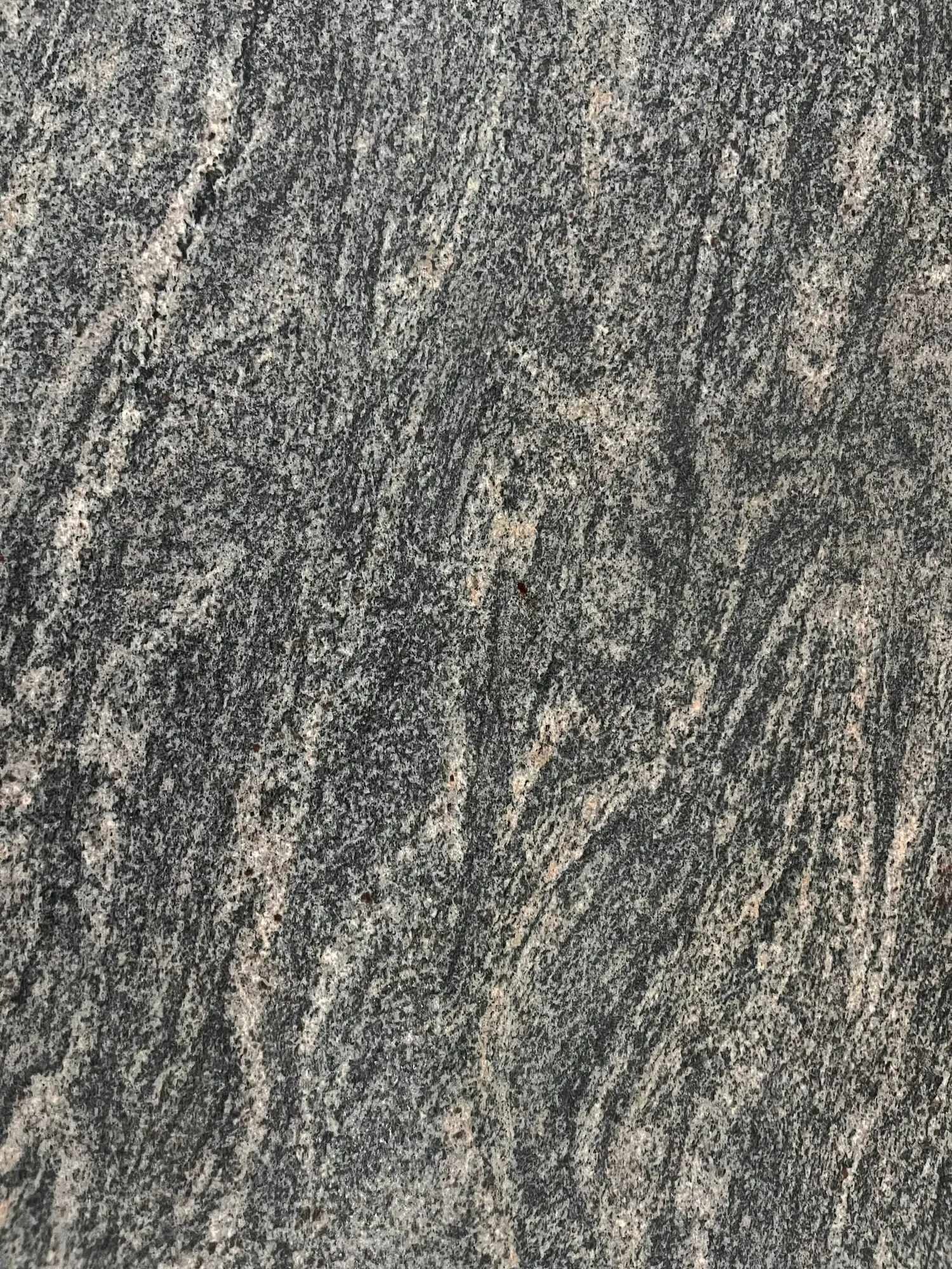Grey granite slab with a wave pattern